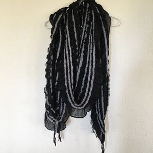 Black ruffled stretchy long scarf.